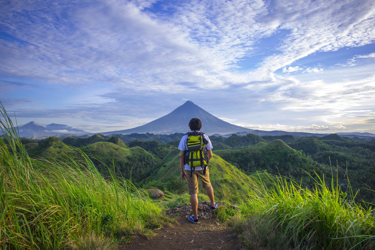 a hiker standing and looking at the scenery